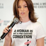 Elizabeth Banks speaks at the NWLC ''Being A Woman Is Not A Pre-Existing Condition'' press conference at Hyatt Regency Century Plaza on November 5, 2009 in Century City, California. NWLC And Elizabeth Banks "Being A Woman Is Not A Pre-Existing Condition" Hyatt Regency Century Plaza Century City, CA United States November 5, 2009 Photo by Noel Vasquez/FilmMagic.com To license this image (58836242), contact FilmMagic.com