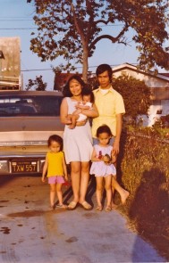 My family with me, their first American daughter, one year after arriving.