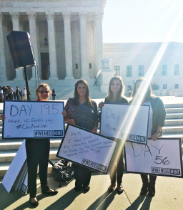 NWLC staff stood in front of the Supreme Court to say "#WeNeedNine!"