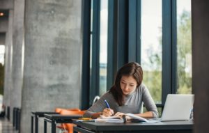 A student studies in a library