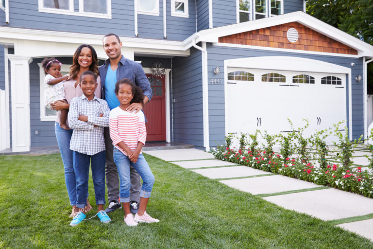 family outside a house